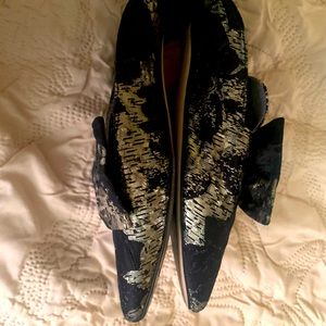 Dressy flat mules. Black and gold. Will add style to any outfit.  Like new.